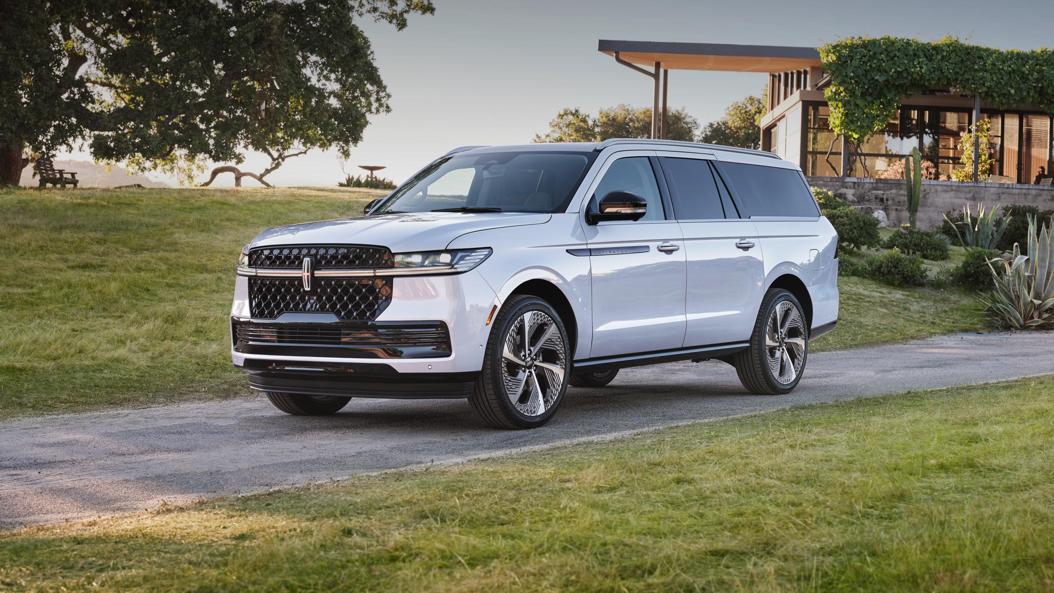 2026 Lincoln Navigator SUV parked in front of a modern house.