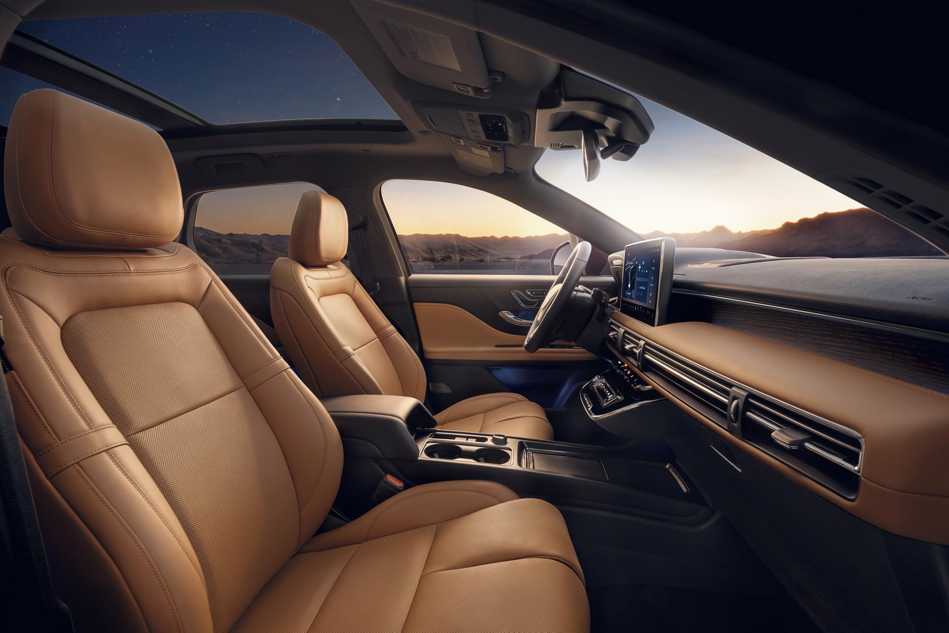 The interior of a 2027 Lincoln Corsair® Hybrid featuring Perfect Position front seats