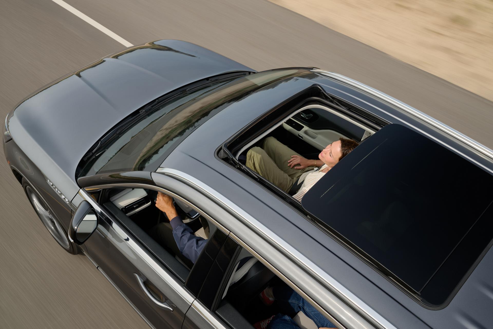 An overhead view 2027 Lincoln Aviator® with the available panoramic Vista Roof® open