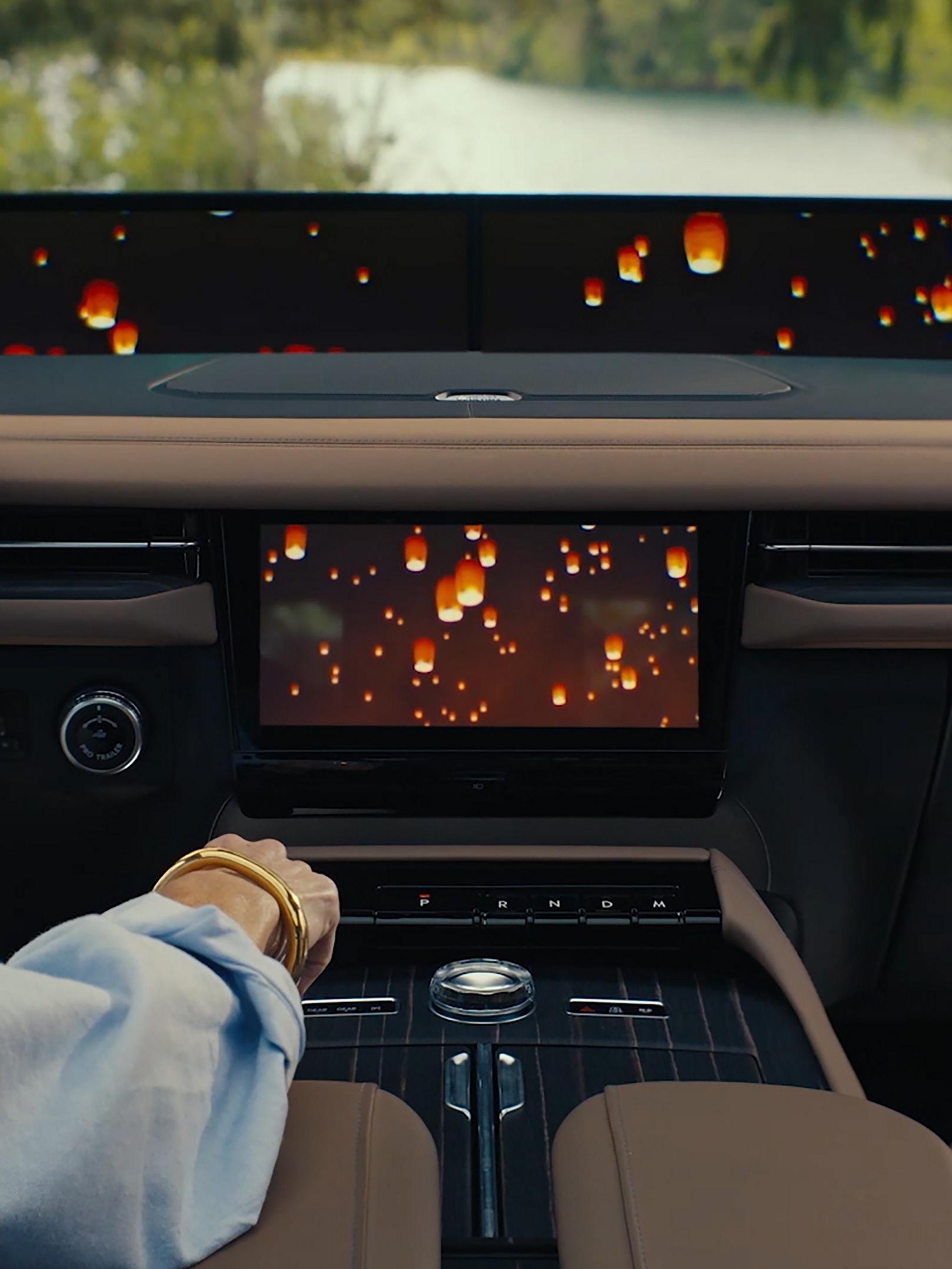 The interior of a 2026 Lincoln Black Label Navigator® SUV with a Lincoln Rejuvenate sequence shown on the panoramic display