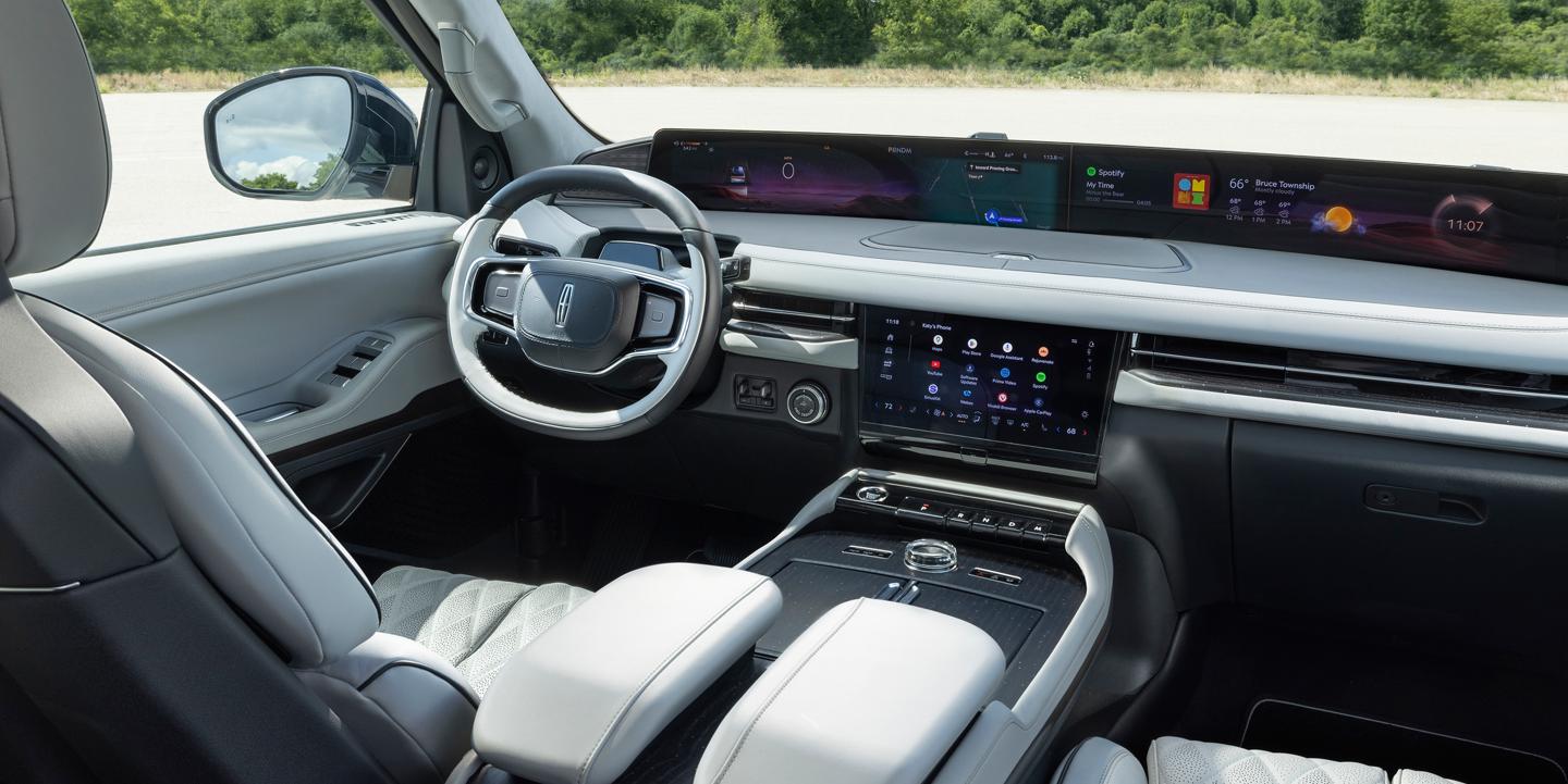 The front interior of a 2027 Lincoln Black Label Navigator® in Atmospheric theme