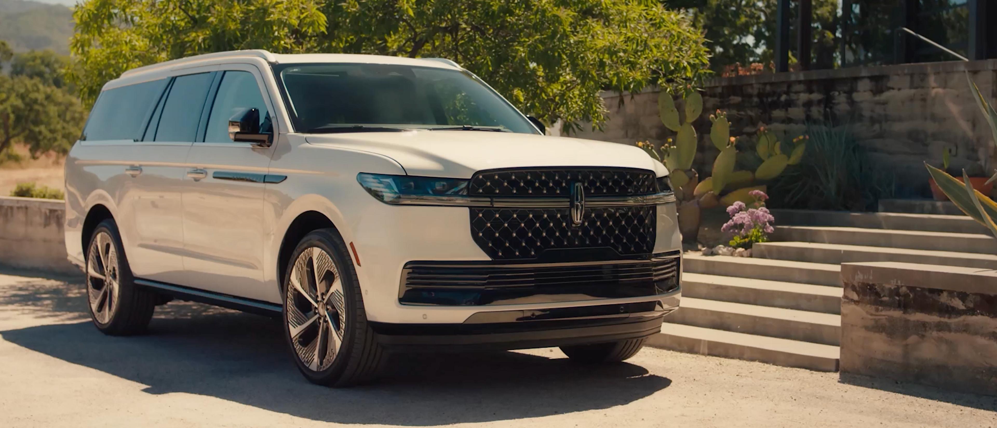 A 2027 Lincoln Navigator® SUV parked at a country retreat