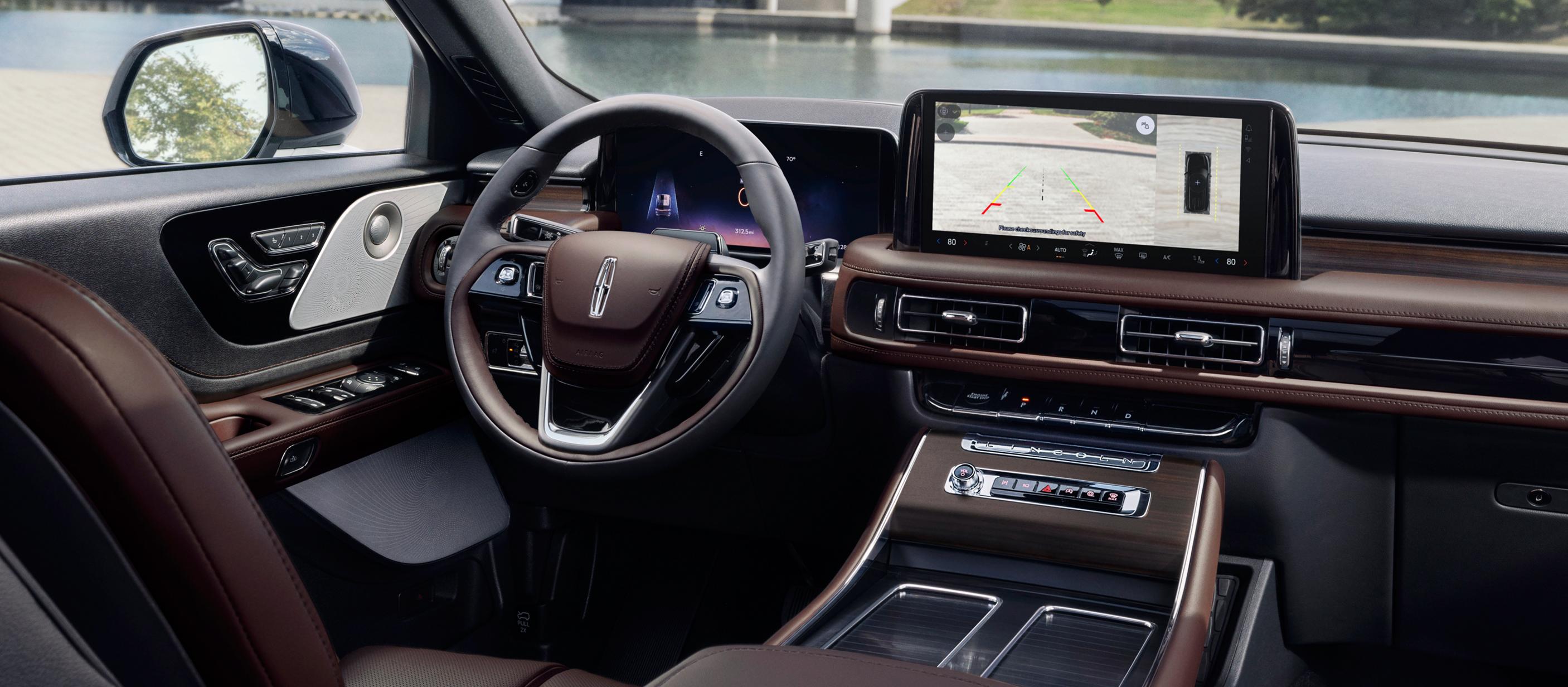 A rear view of what is behind a 2026 Lincoln Aviator is shown in the centre touchscreen