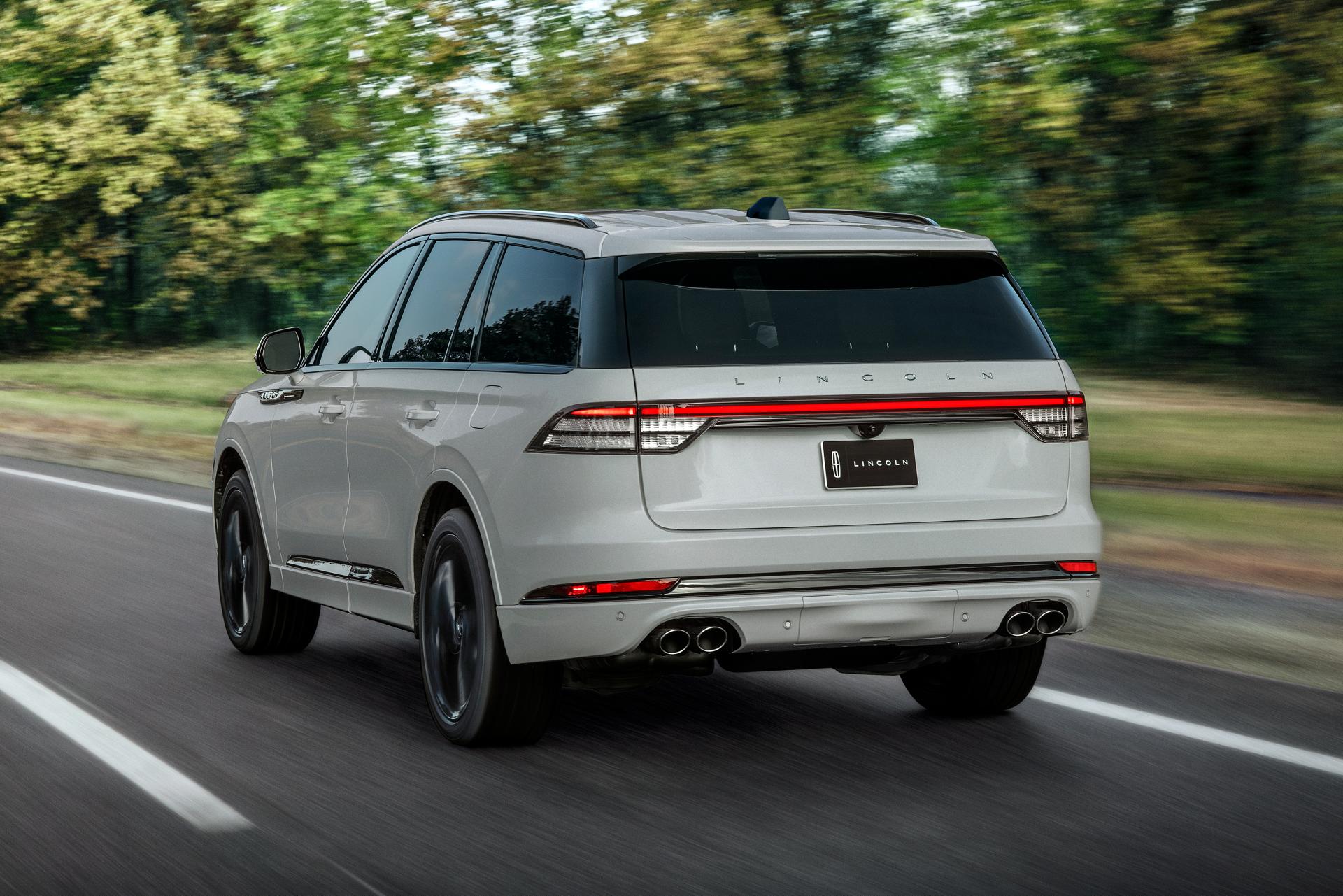 A 2027 Lincoln Aviator® is being driven on a country road