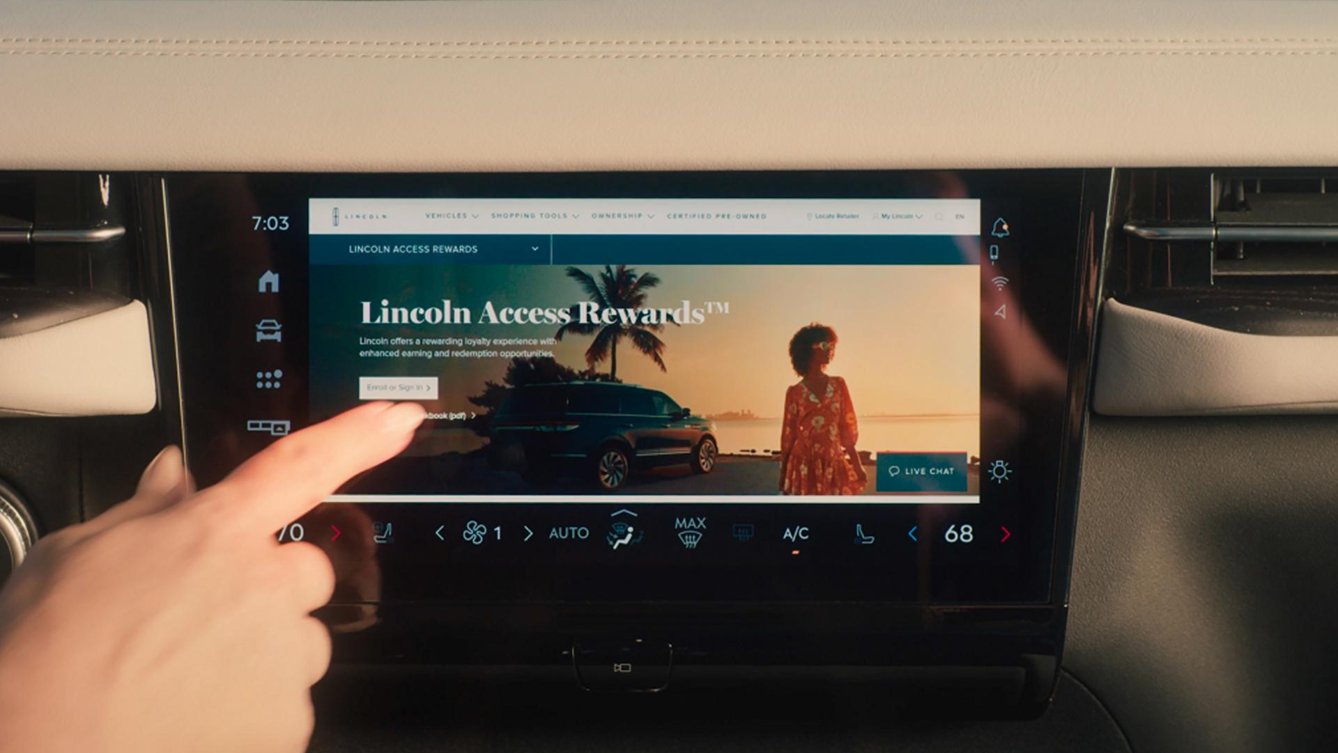 A person is looking at their mobile device that displays the Lincoln App