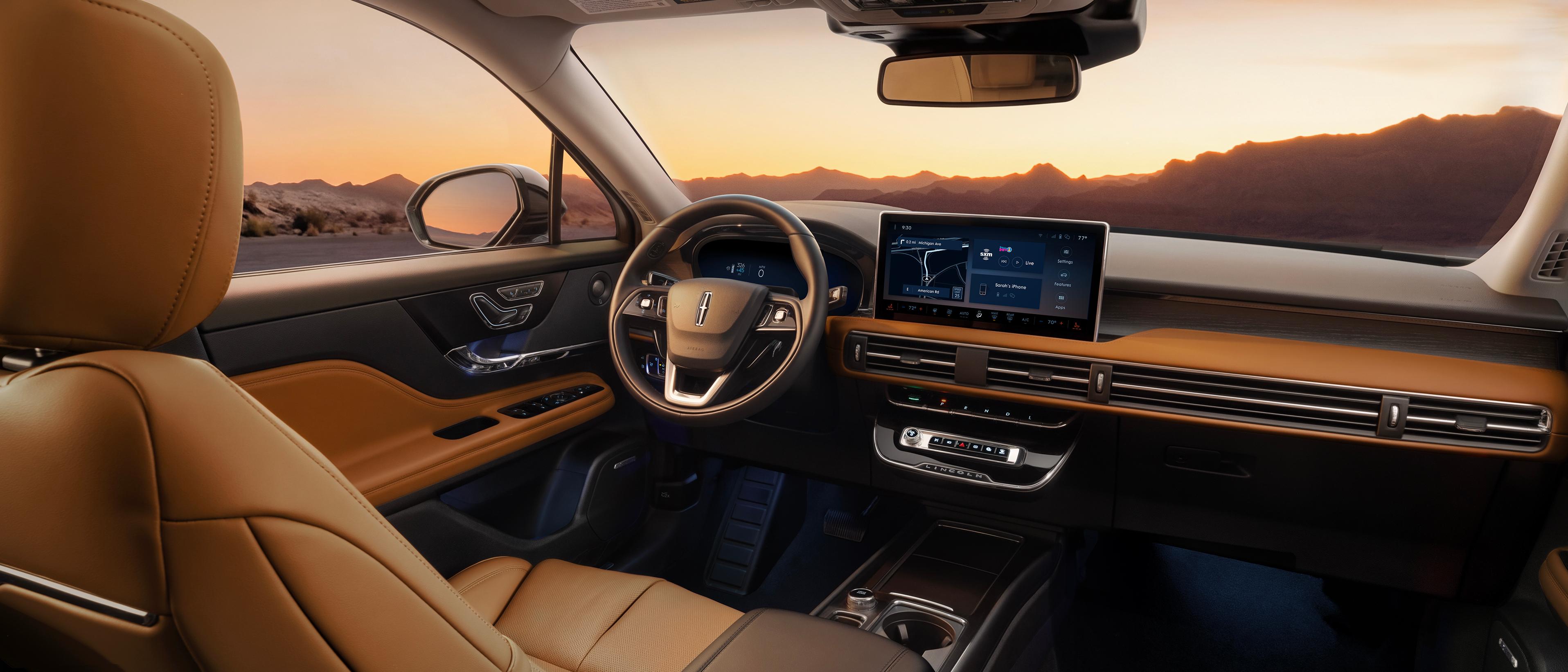 The interior of a 2027 Lincoln Corsair® Hybrid with the Stellar Sun interior color.