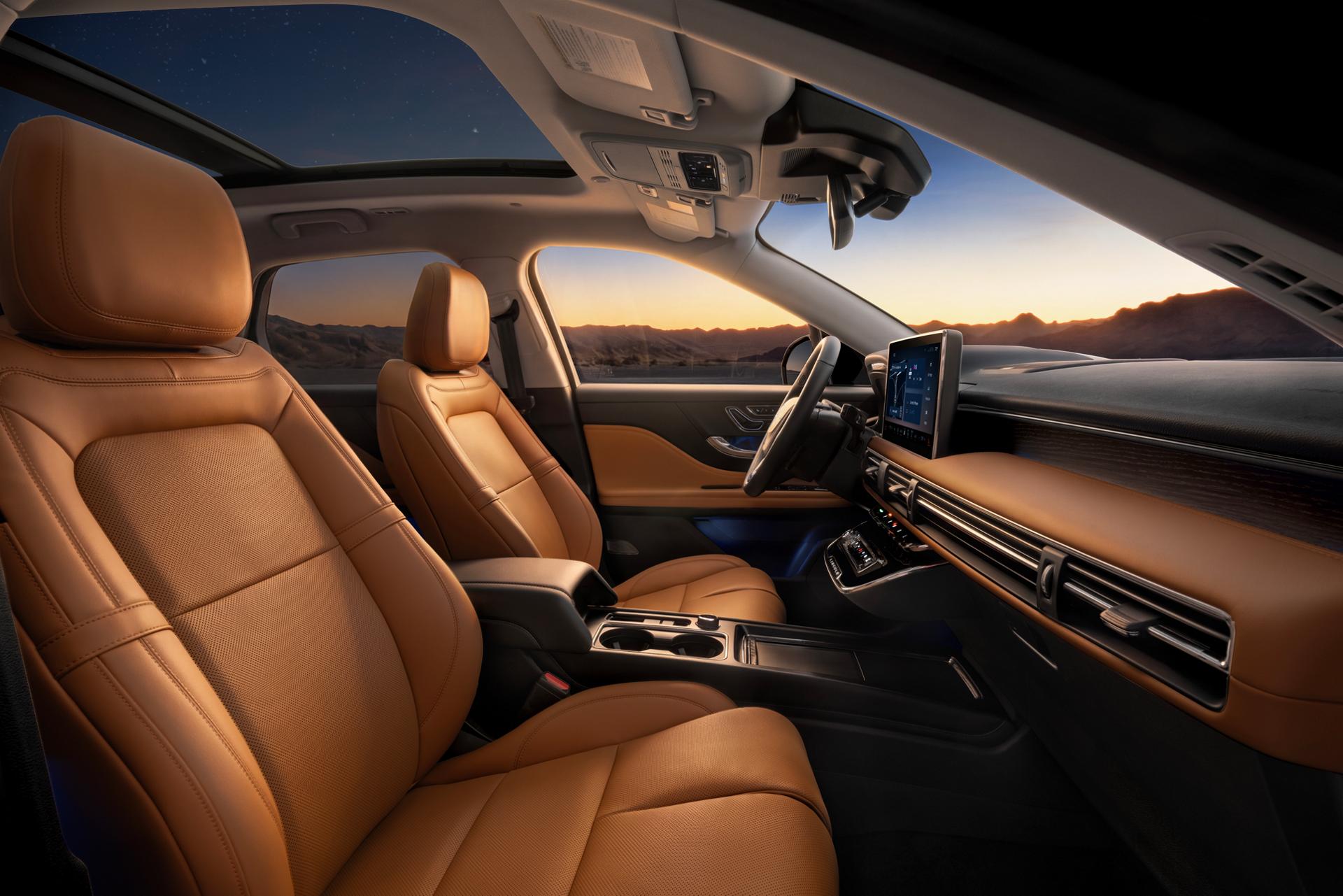 The interior of a 2027 Lincoln Corsair® Hybrid featuring Perfect Position front seats