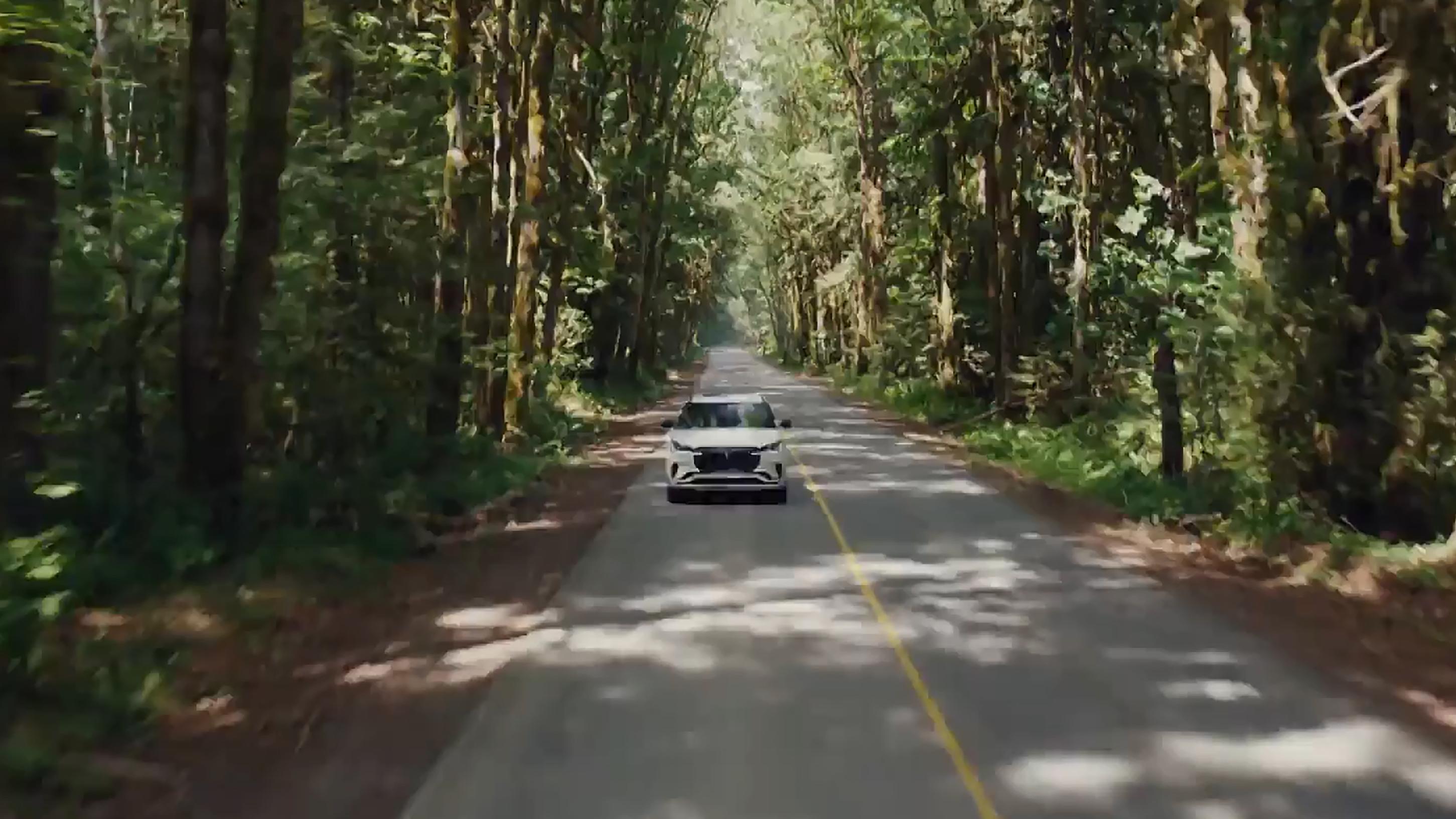 A 2026 Lincoln Aviator is being driven on a rural road