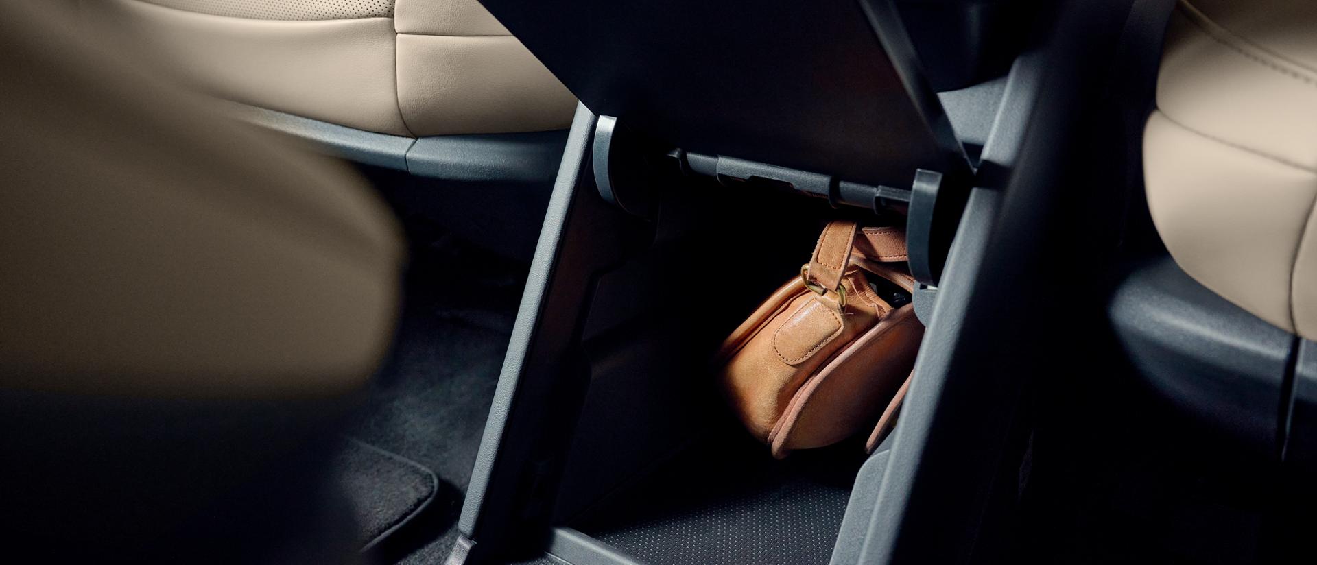 The available second-row console provides convenient storage to safely stow small personal items