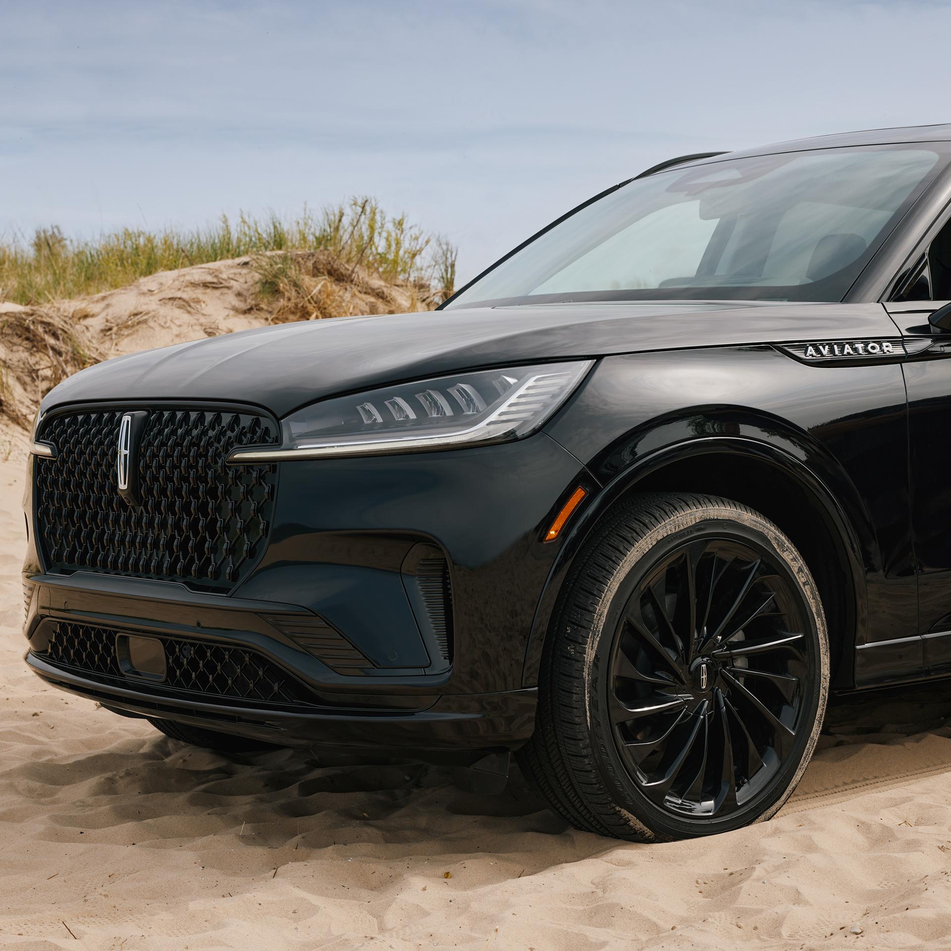 A 2027 Lincoln Aviator® is parked on a seaside overlook