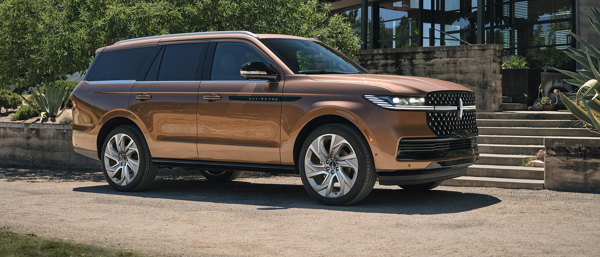 The 2025 Lincoln Navigator parked outside a building
