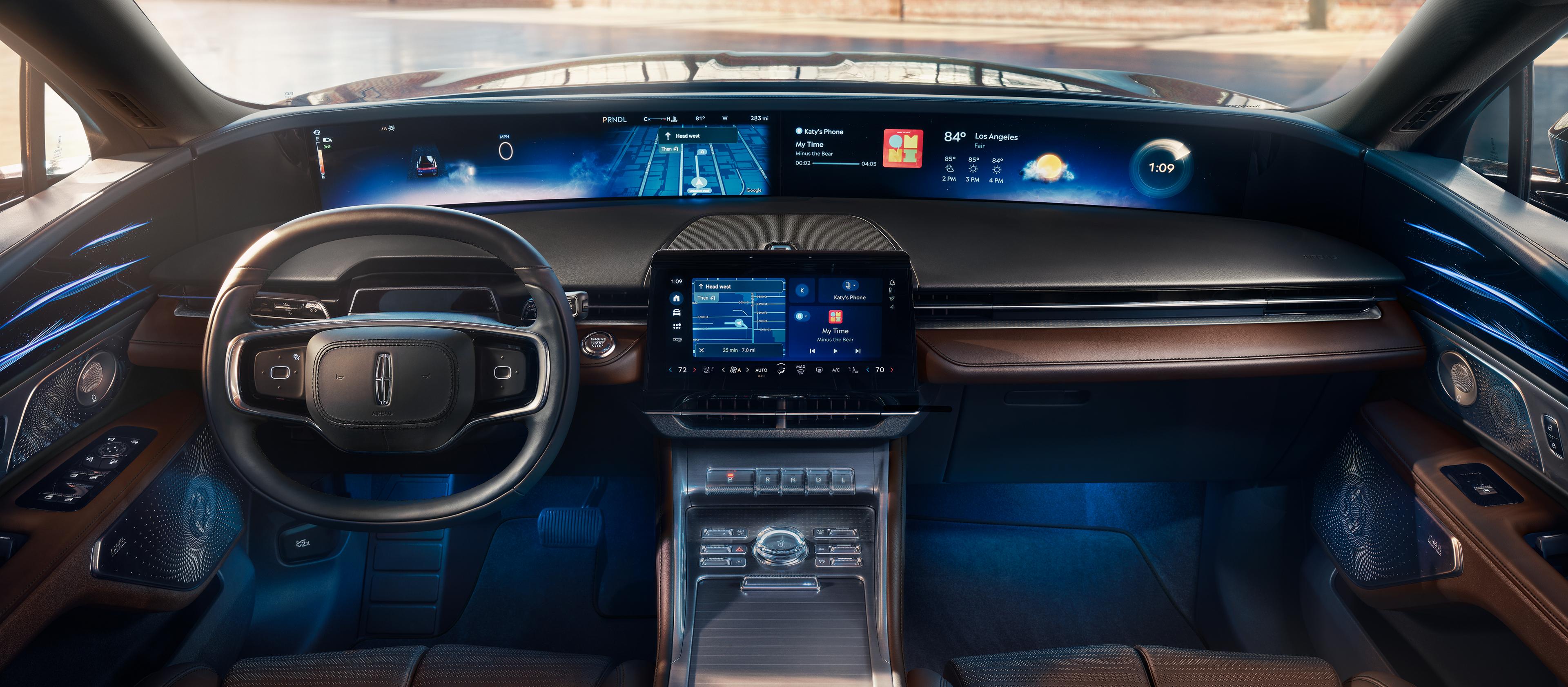 The 48-inch panoramic display is shown in a 2027 Nautilus® Reserve model with the Hot Chocolate interior
