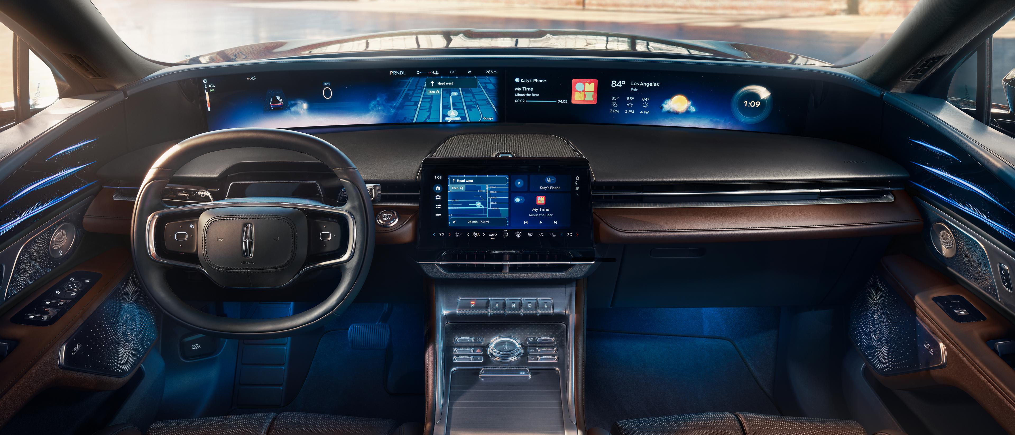 The 48-inch panoramic display is shown in a 2027 Nautilus® Reserve model with the Hot Chocolate interior