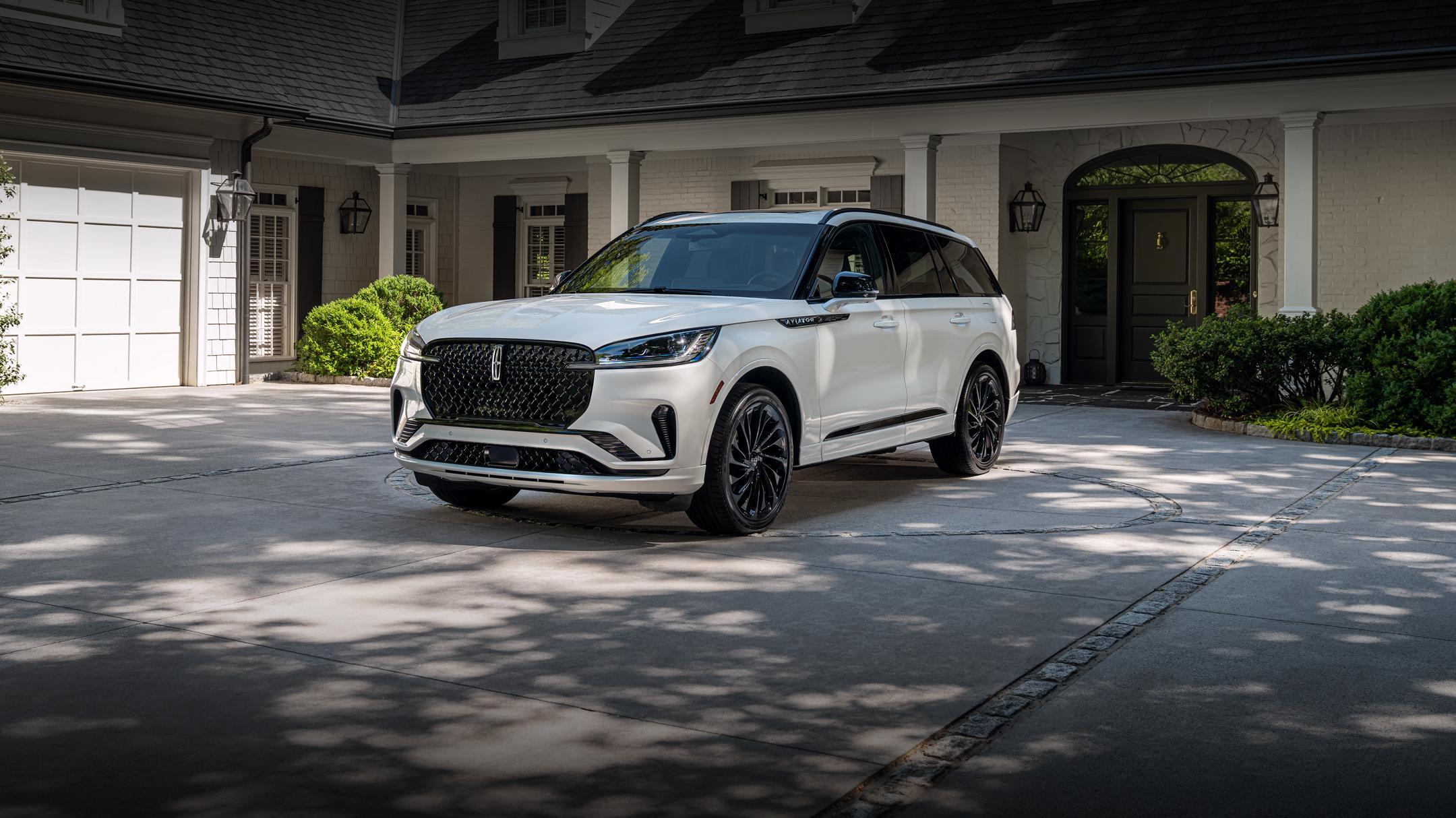 A 2026 Lincoln Aviator SUV parked in a driveway.