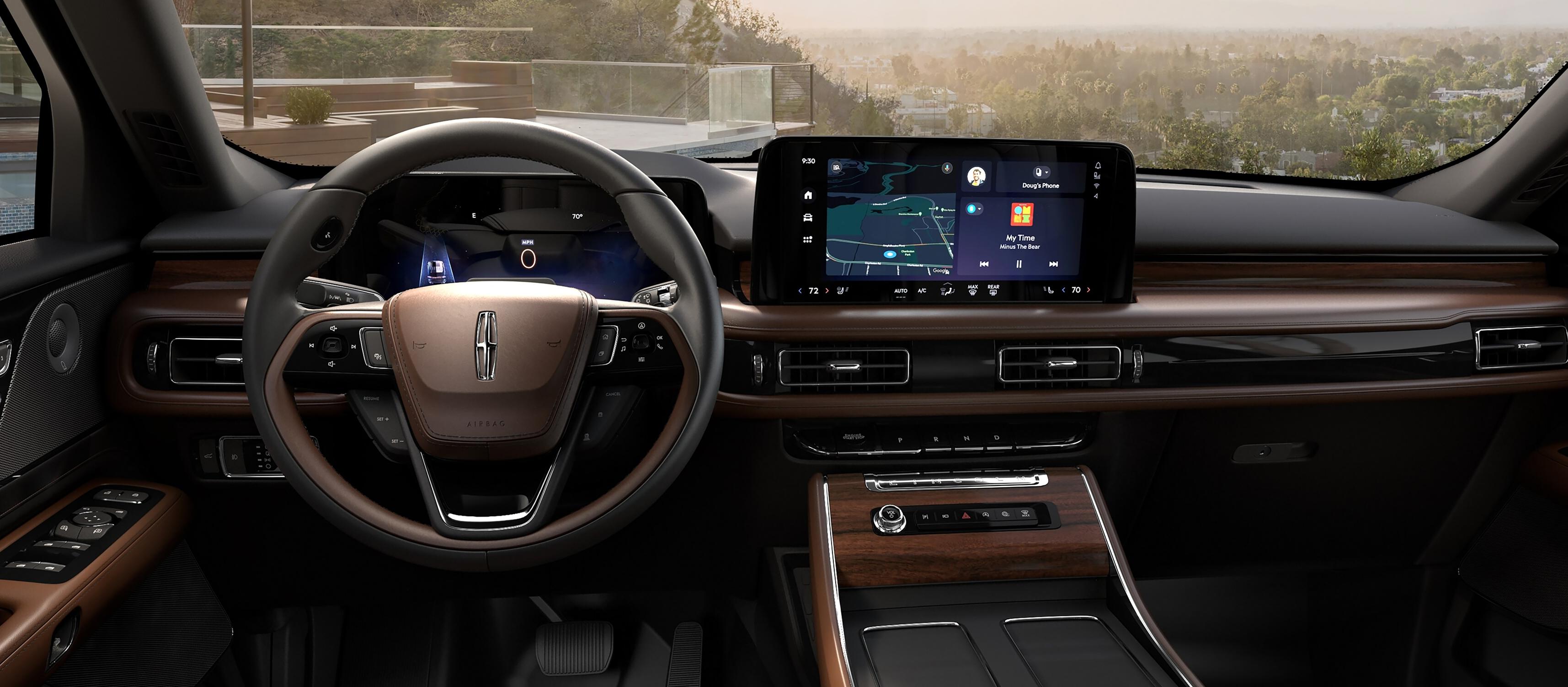 The interior of a 2026 Lincoln Aviator from the second row looking through the windshield