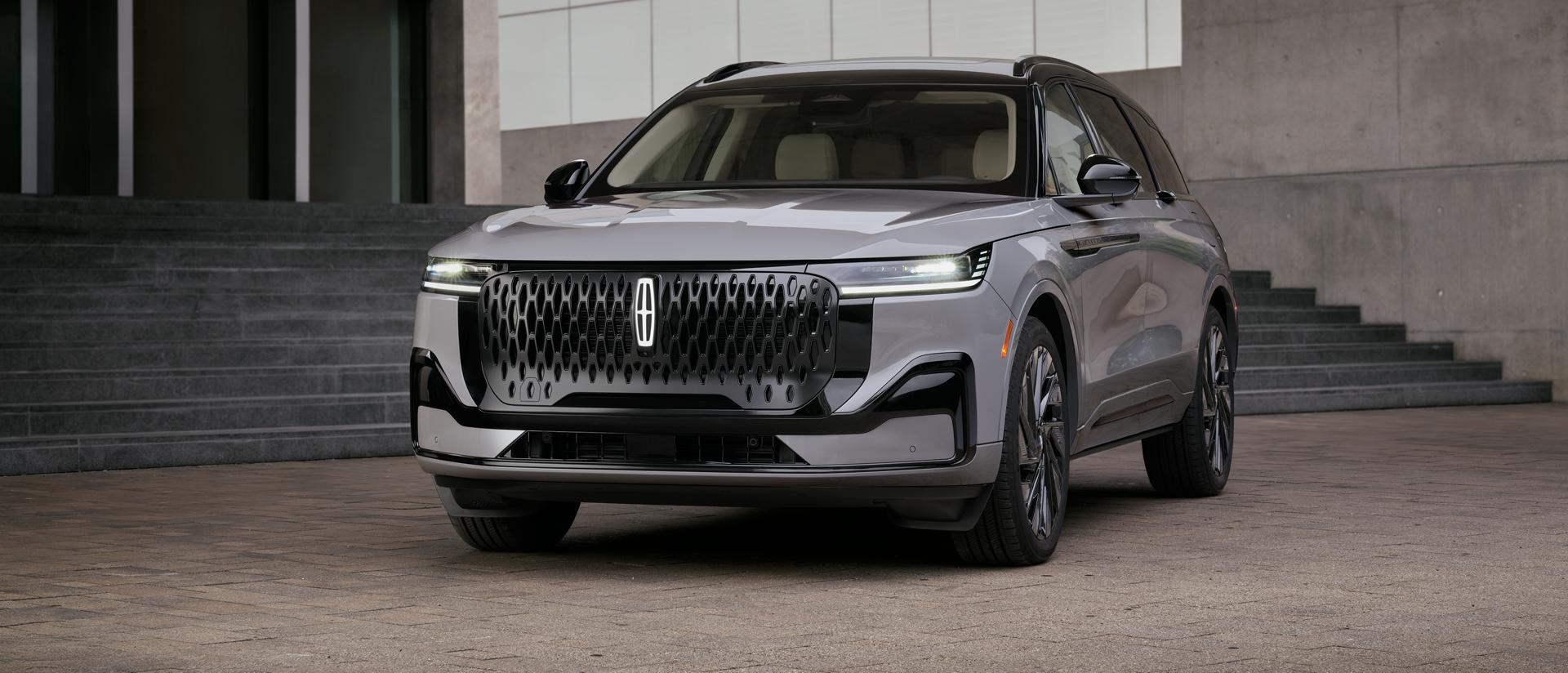 The 2027 Lincoln Nautilus parked infront of a building.