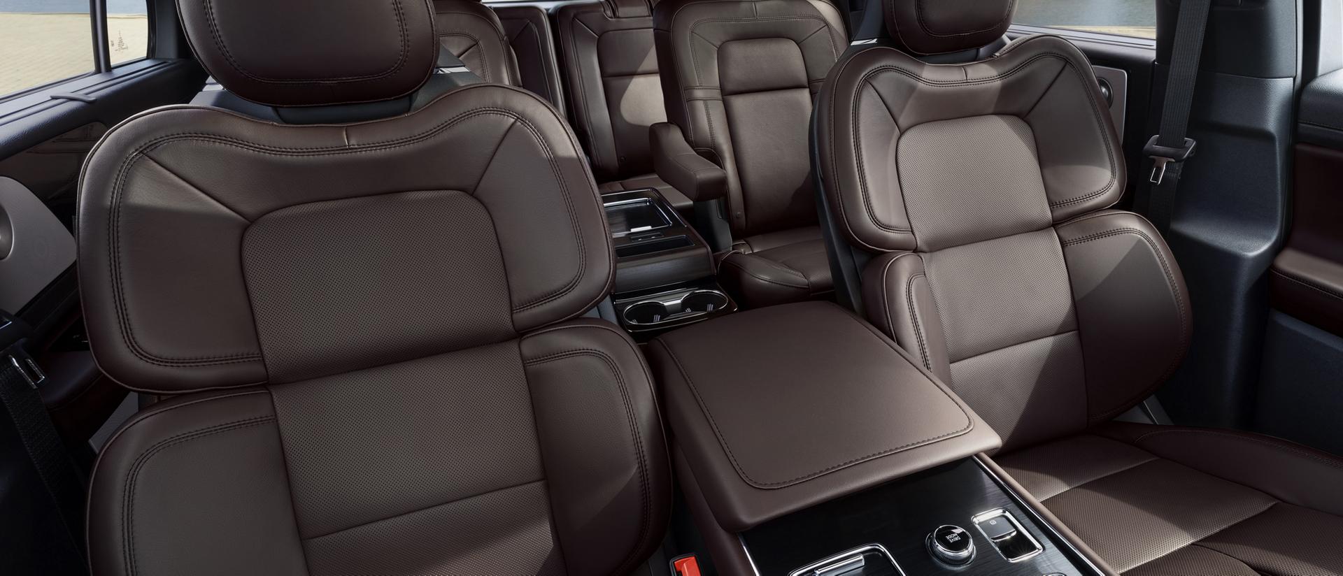 A 2026 Lincoln Aviator® is being driven on a country road