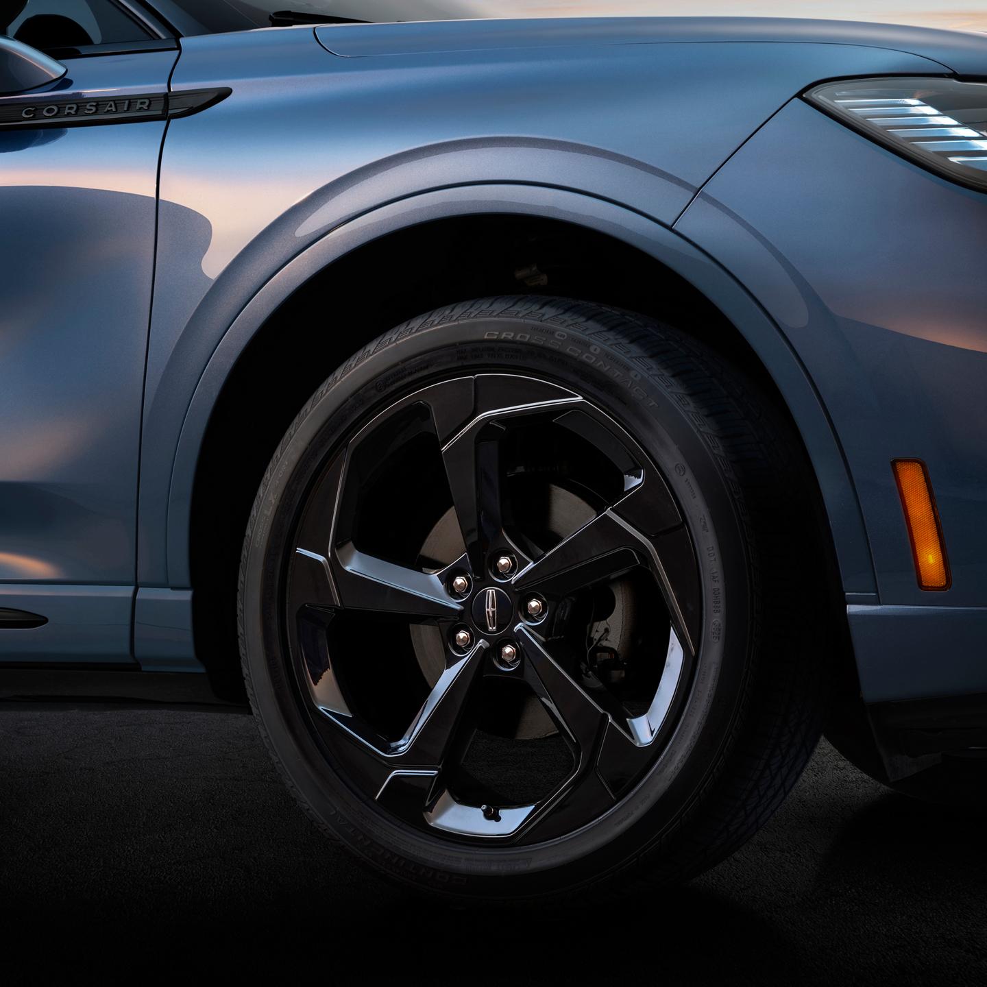 A close-up look at the expressive details on the wheel of a 2027 Lincoln Corsair® Hybrid