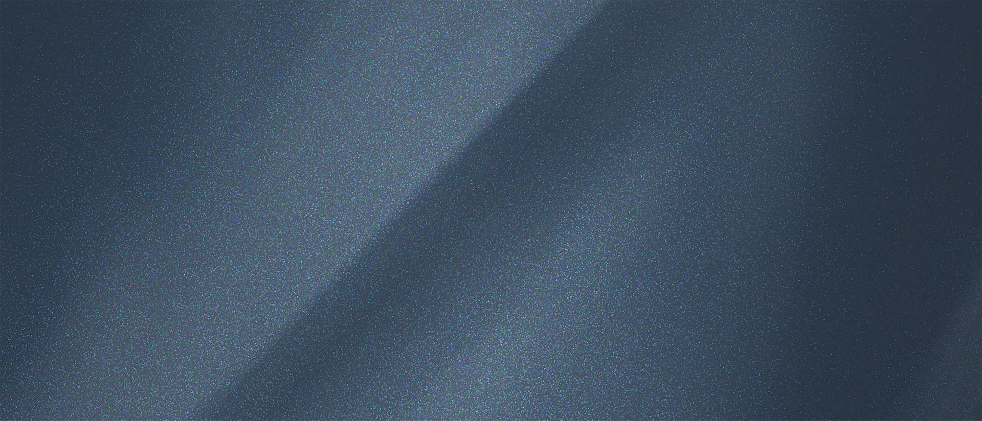 A colour chip representing the extra-cost Nocturnal Blue Metallic Clearcoat exterior colour