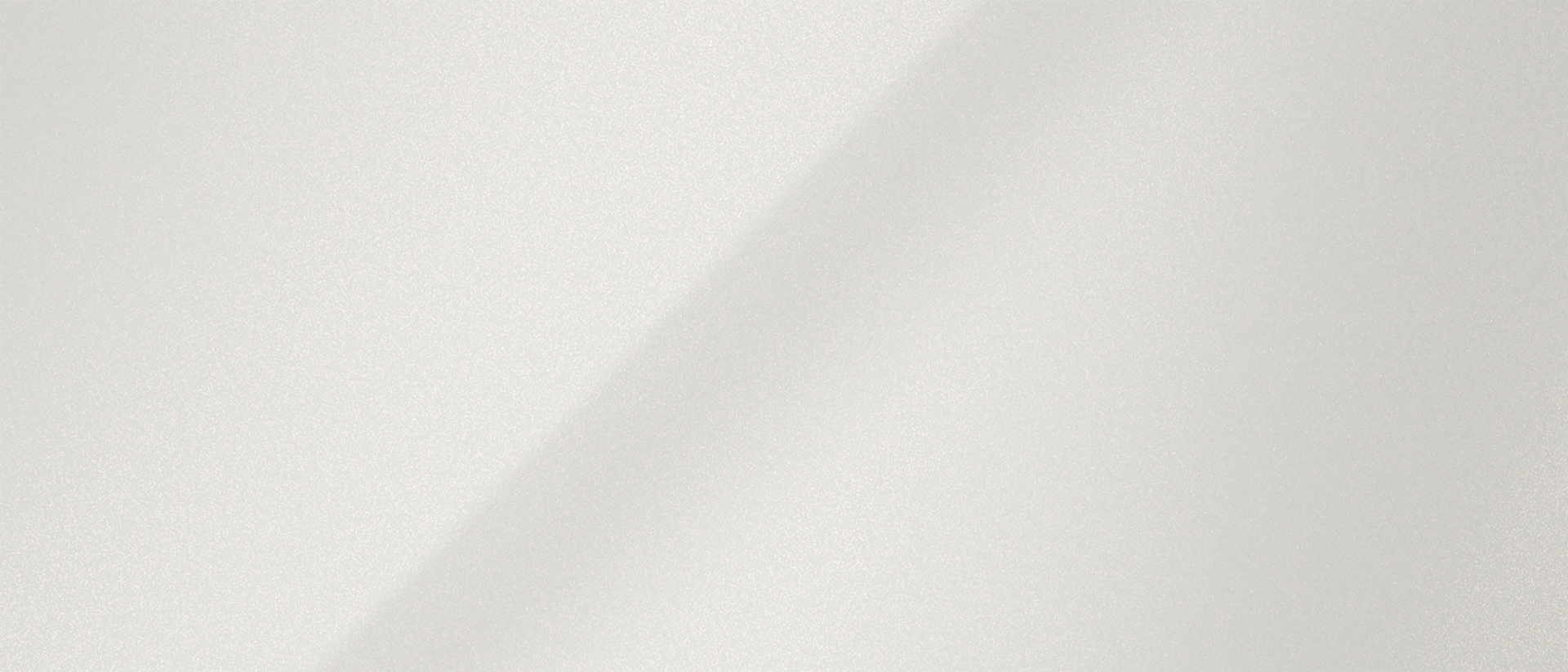A colour chip representing the extra-cost White Platinum Metallic Tri-Coat exterior colour