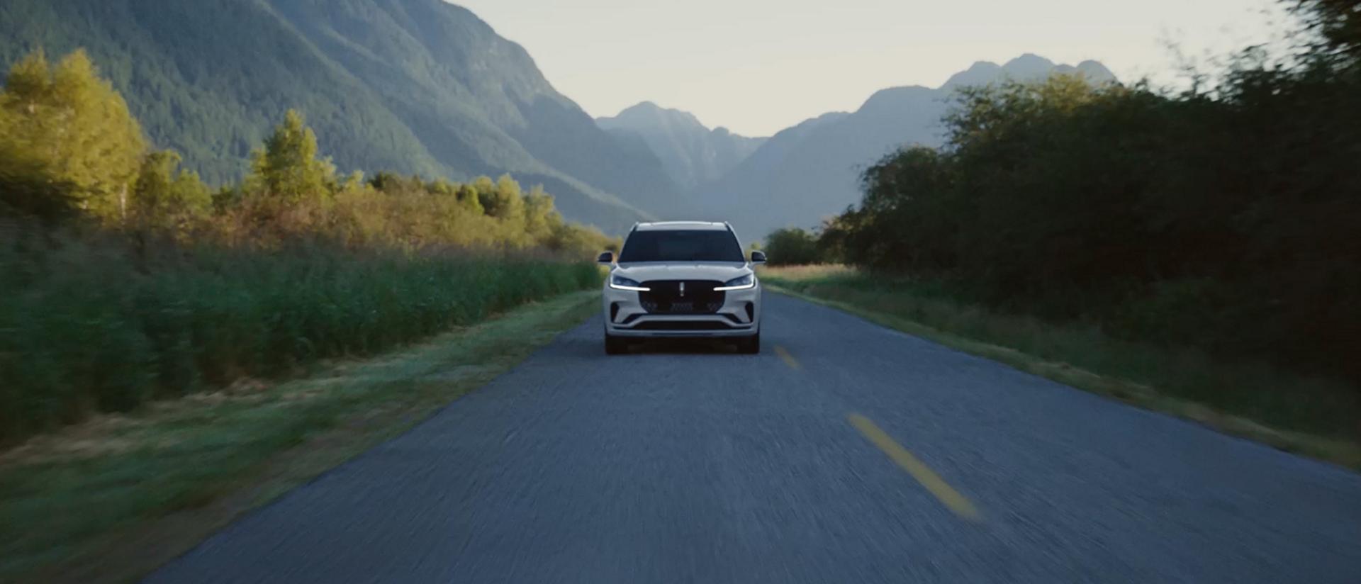 A 2027 Lincoln Aviator® being driven on a country road