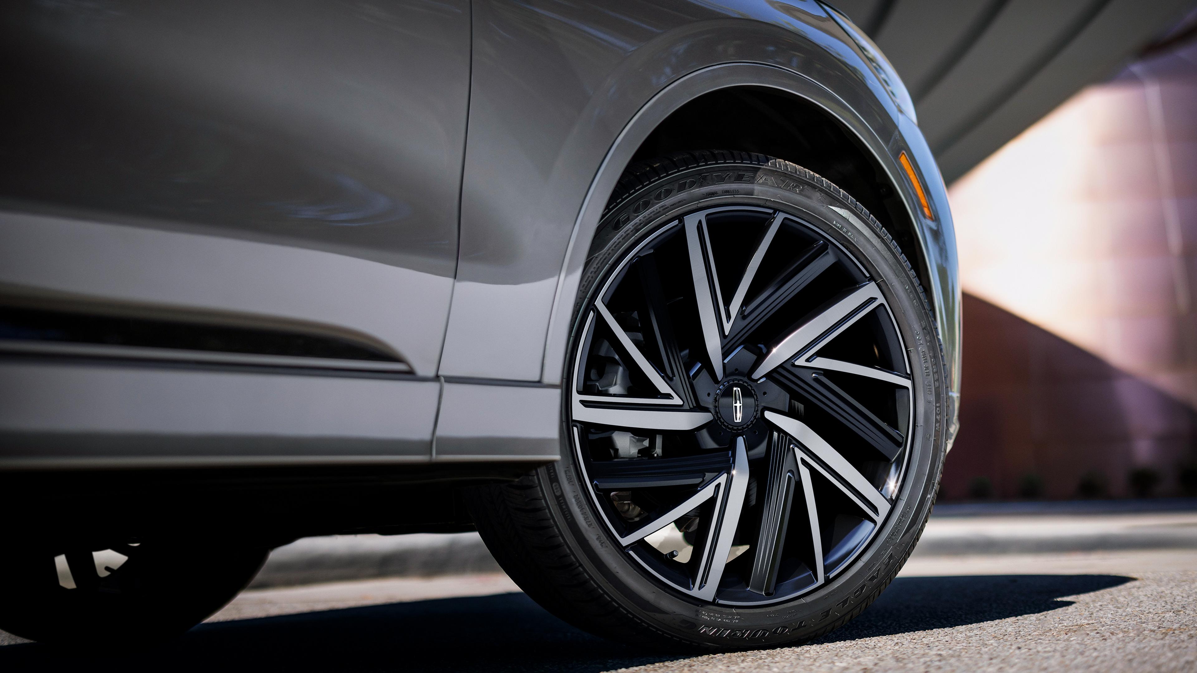 A close-up of the wheel of a 2027 Lincoln Aviator SUV