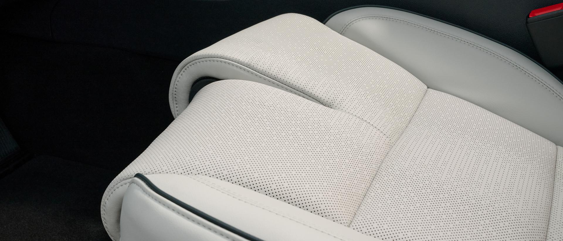 The knee bolsters of the a Perfect Position seat are shown in an adjusted state