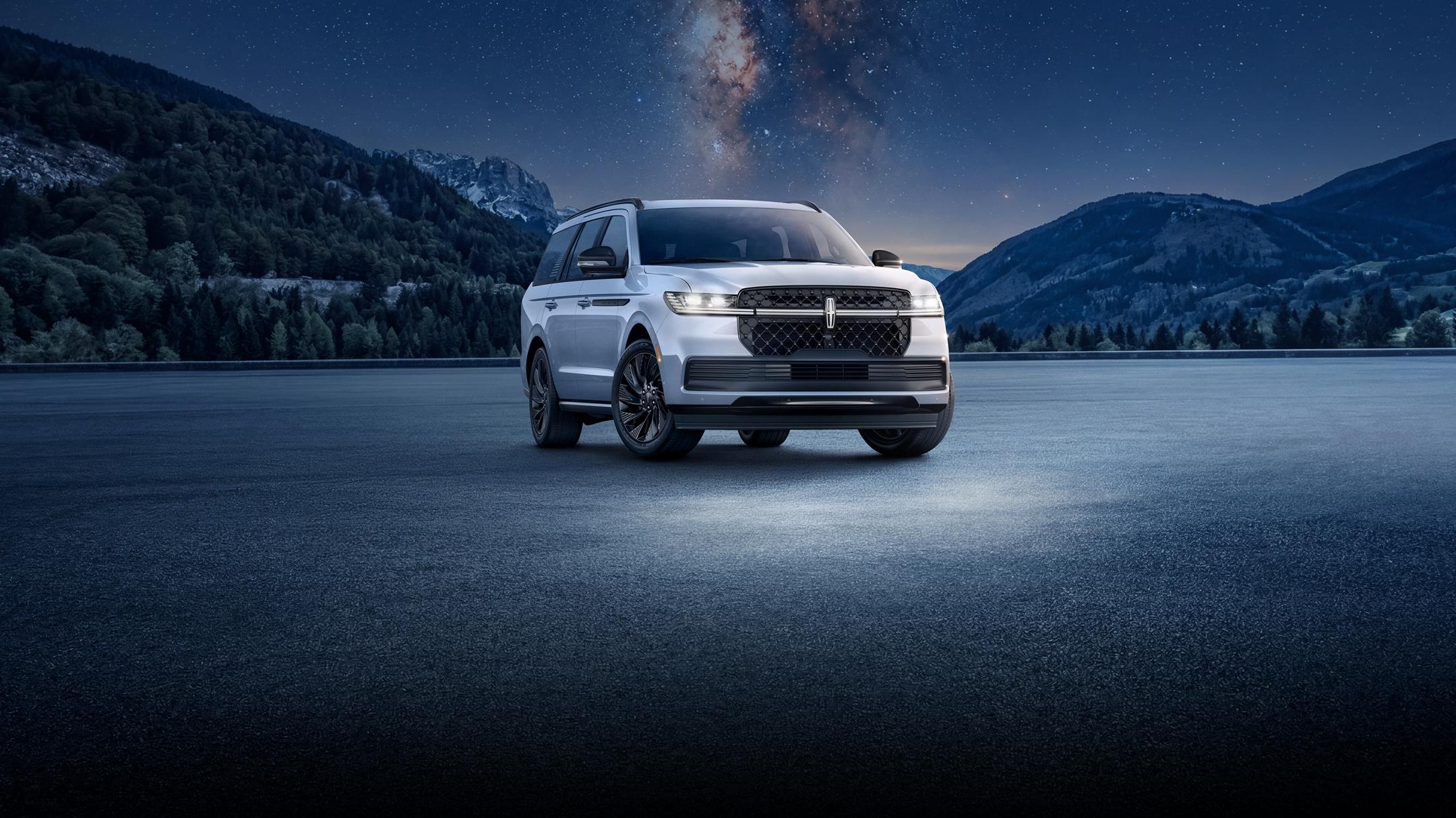 2026 Lincoln Navigator luxury SUV under a starry night sky.