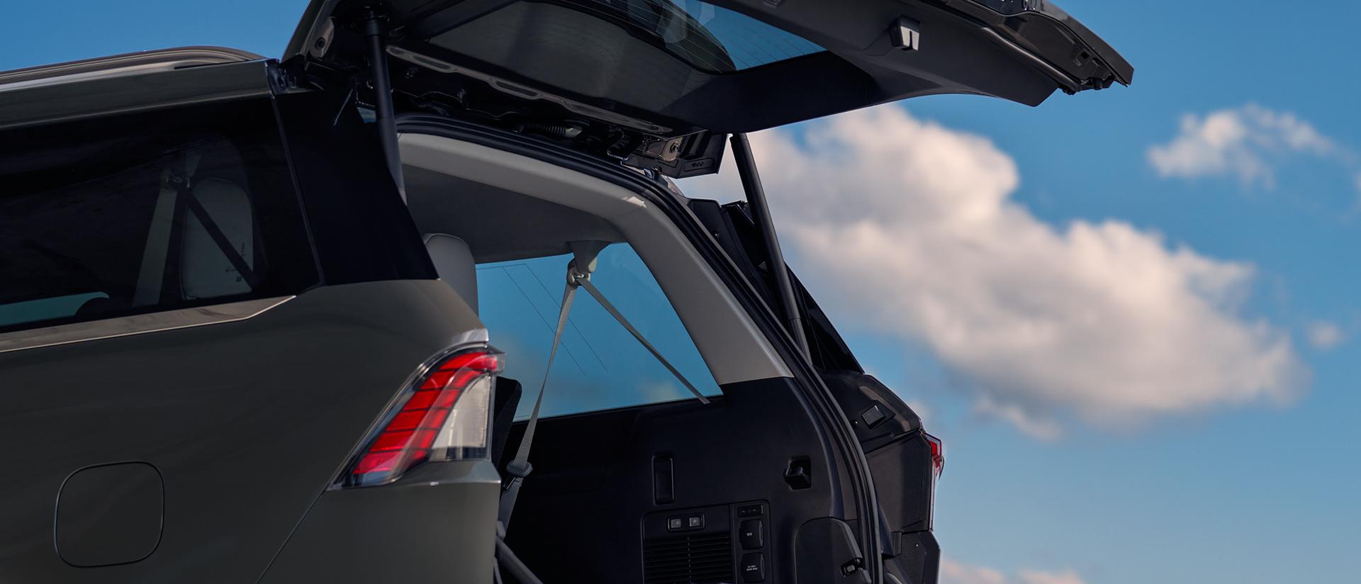 The back of a 2027 Lincoln Navigator® SUV opens showcasing the spacious cargo area