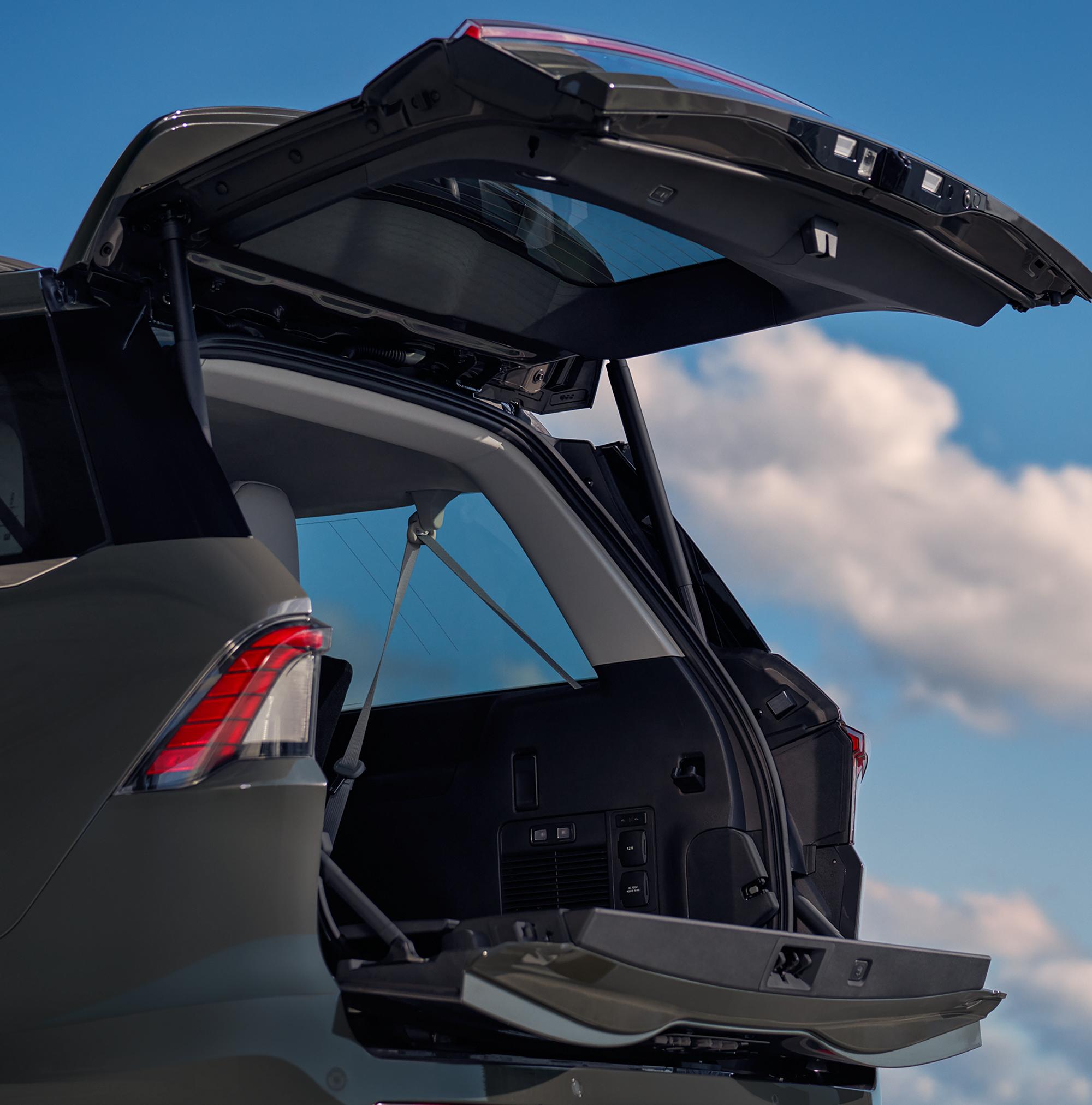 The back of a 2027 Lincoln Navigator® SUV opens showcasing the spacious cargo area