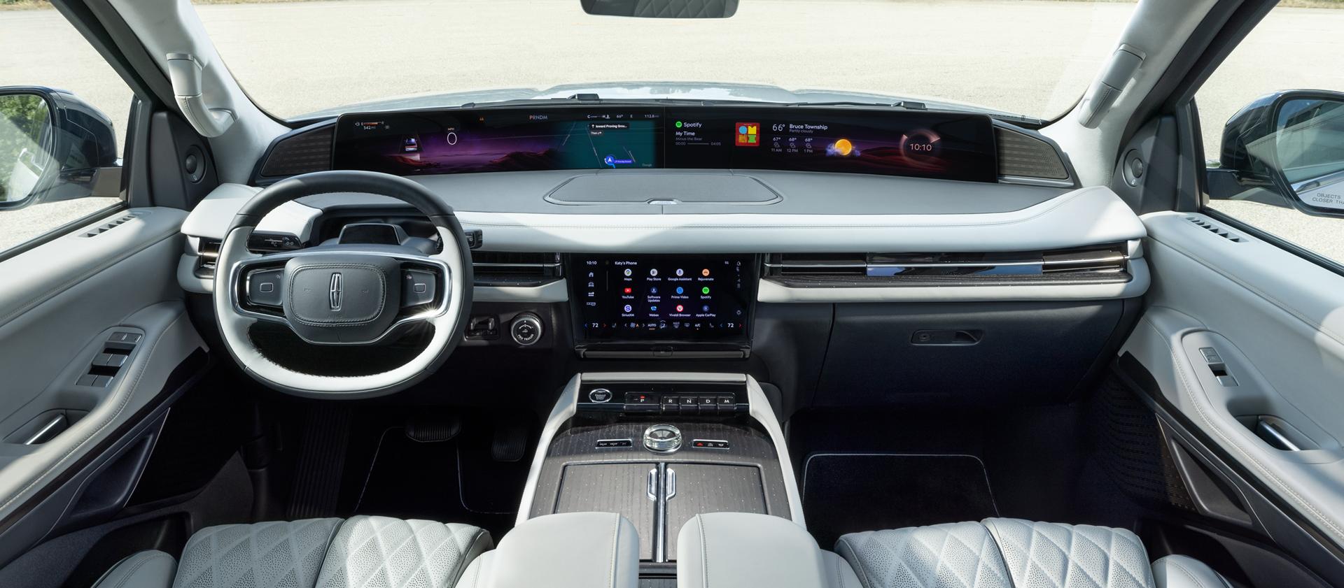 The panoramic display spans the width of a 2027 Lincoln Navigator® Black Label™ model with the Atmospheric interior theme