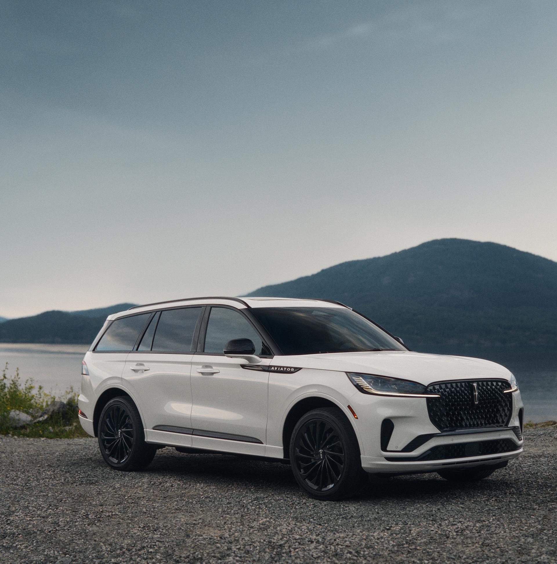 A 2027 Lincoln Aviator® parked near a lakeshore