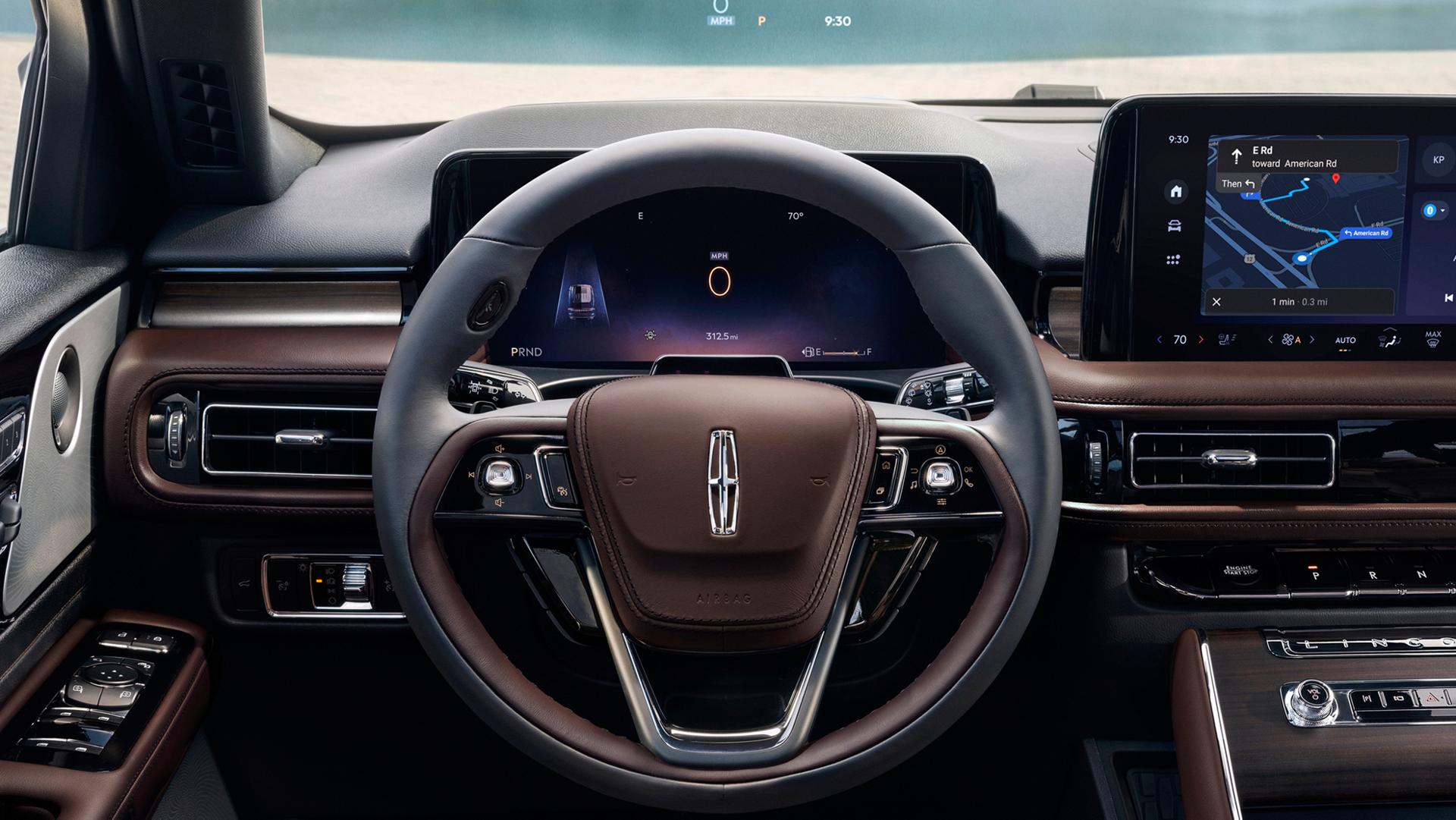 Driving information is projected on the windshield via the head up display system