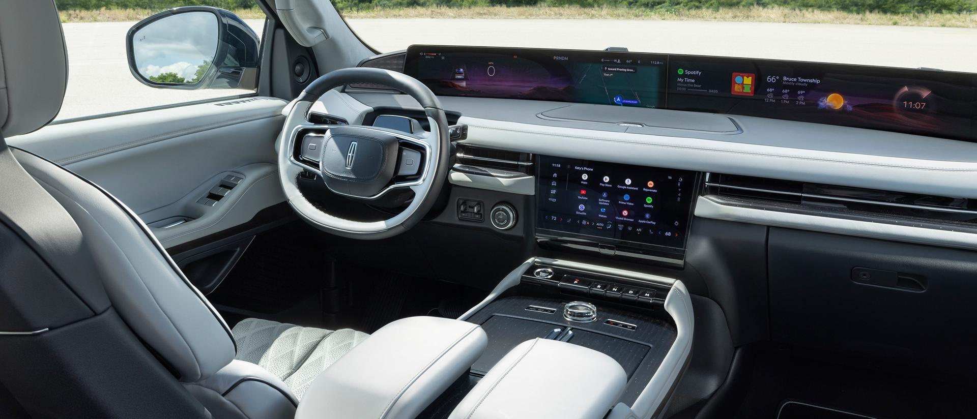 The panoramic display of a 2026 Lincoln Navigator shown with a variety of apps showing on the centre stack screen
