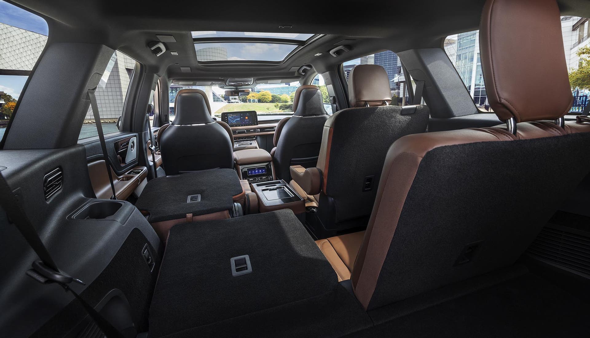 A third and second-row seat of a 2027 Lincoln Aviator is folded flat