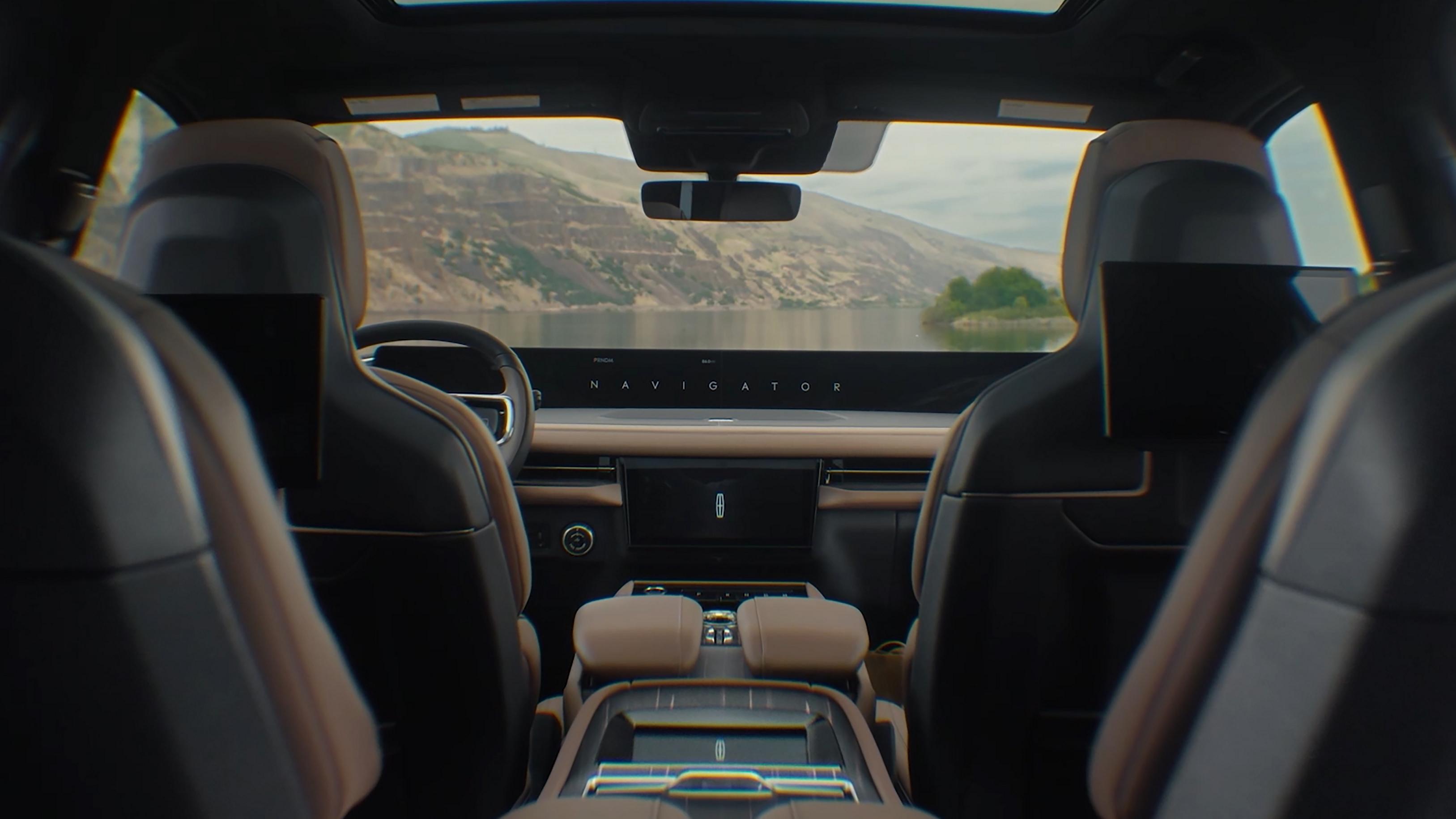 The interior of a 2026 Lincoln Black Label Navigator® SUV with the Enlighten theme