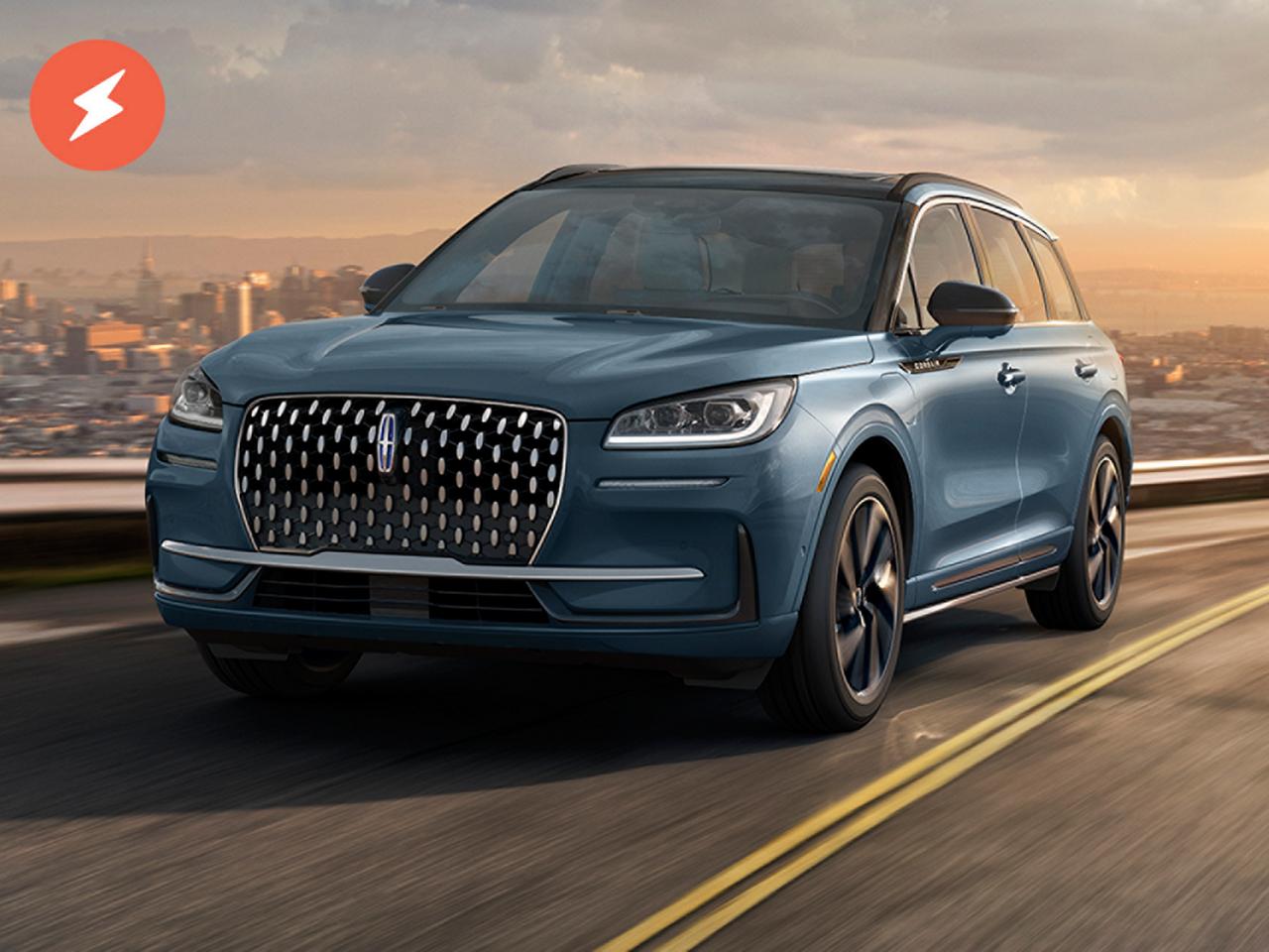 The Lincoln Corsair driving down the road. Available plug-in hybrid.