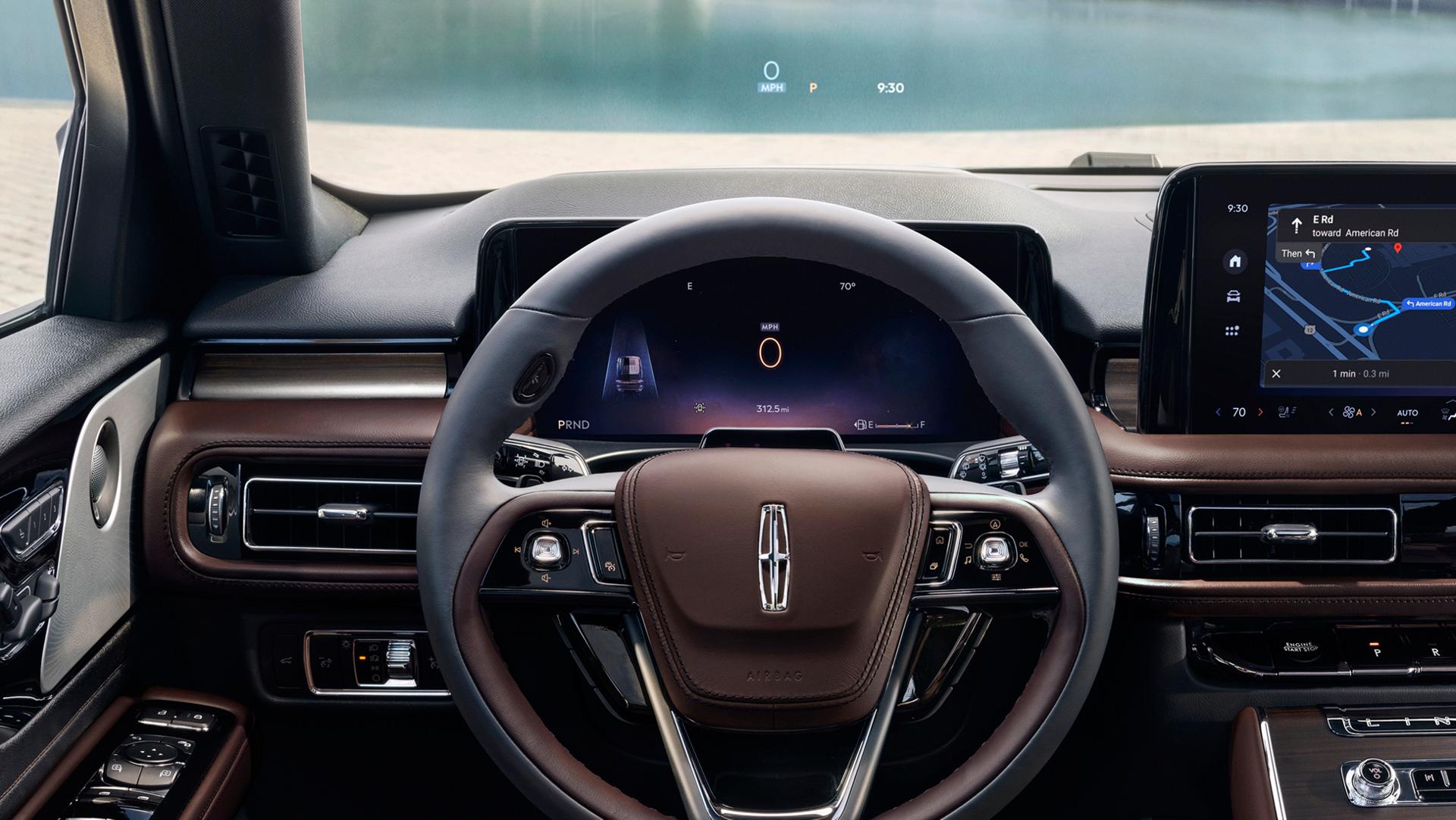 Driving information is projected on the windshield via the head up display system