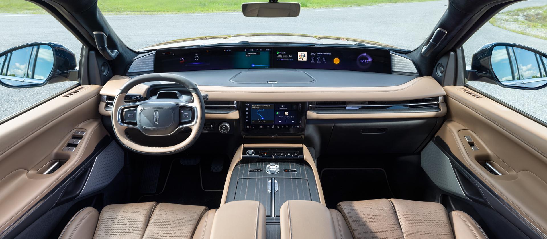 The interior of a 2027 Lincoln Navigator® Black Label™ model plays host to a dramatic panoramic display