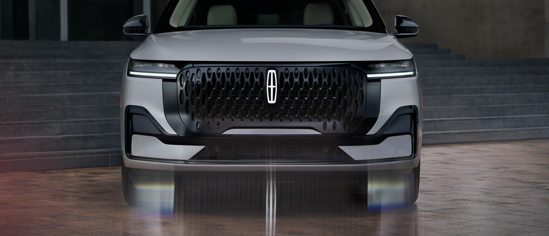 A 2027 Lincoln Nautilus® SUV parked against a modern architectural backdrop